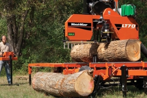 Sawing Logs for Cabins In Michigan